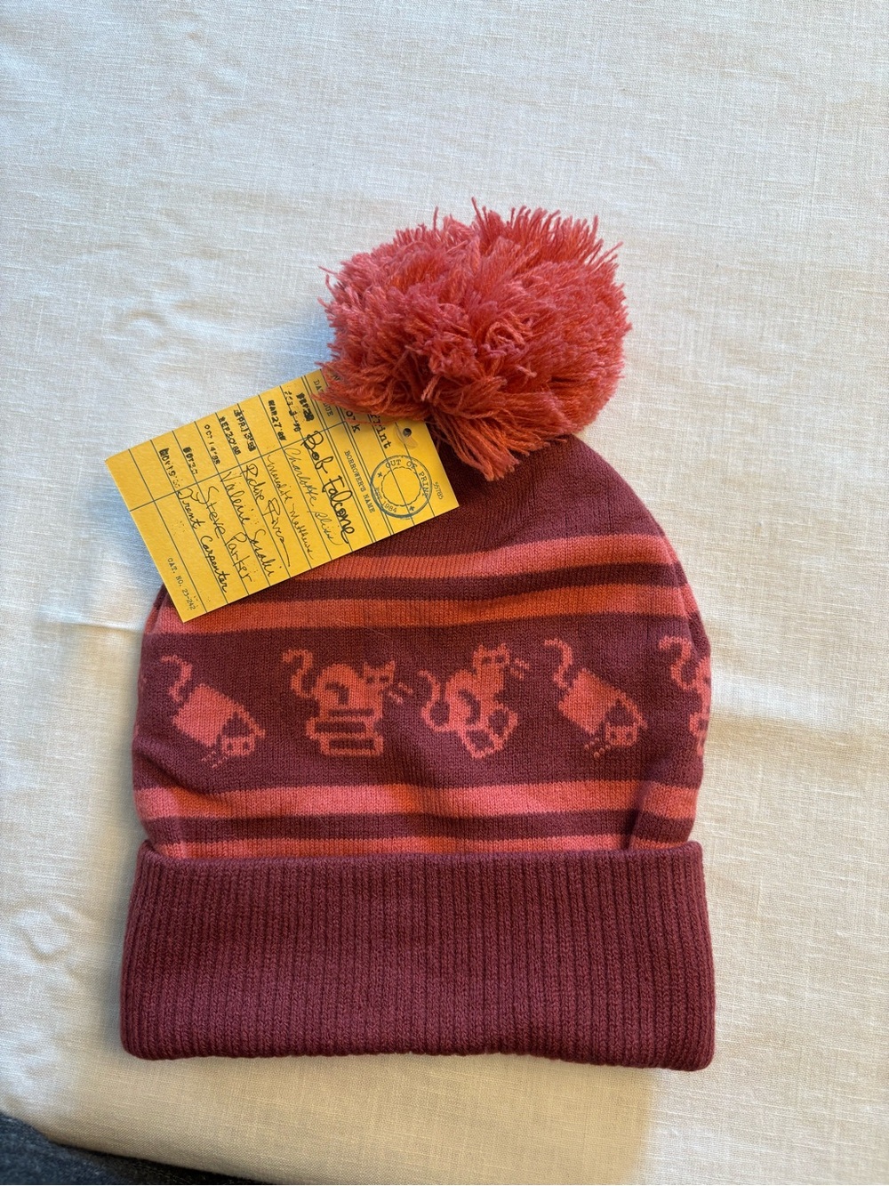 Out of Print Rose Red Pom-Pom beanie with Cat Motif